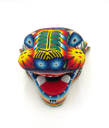 Huichol art jaguar head