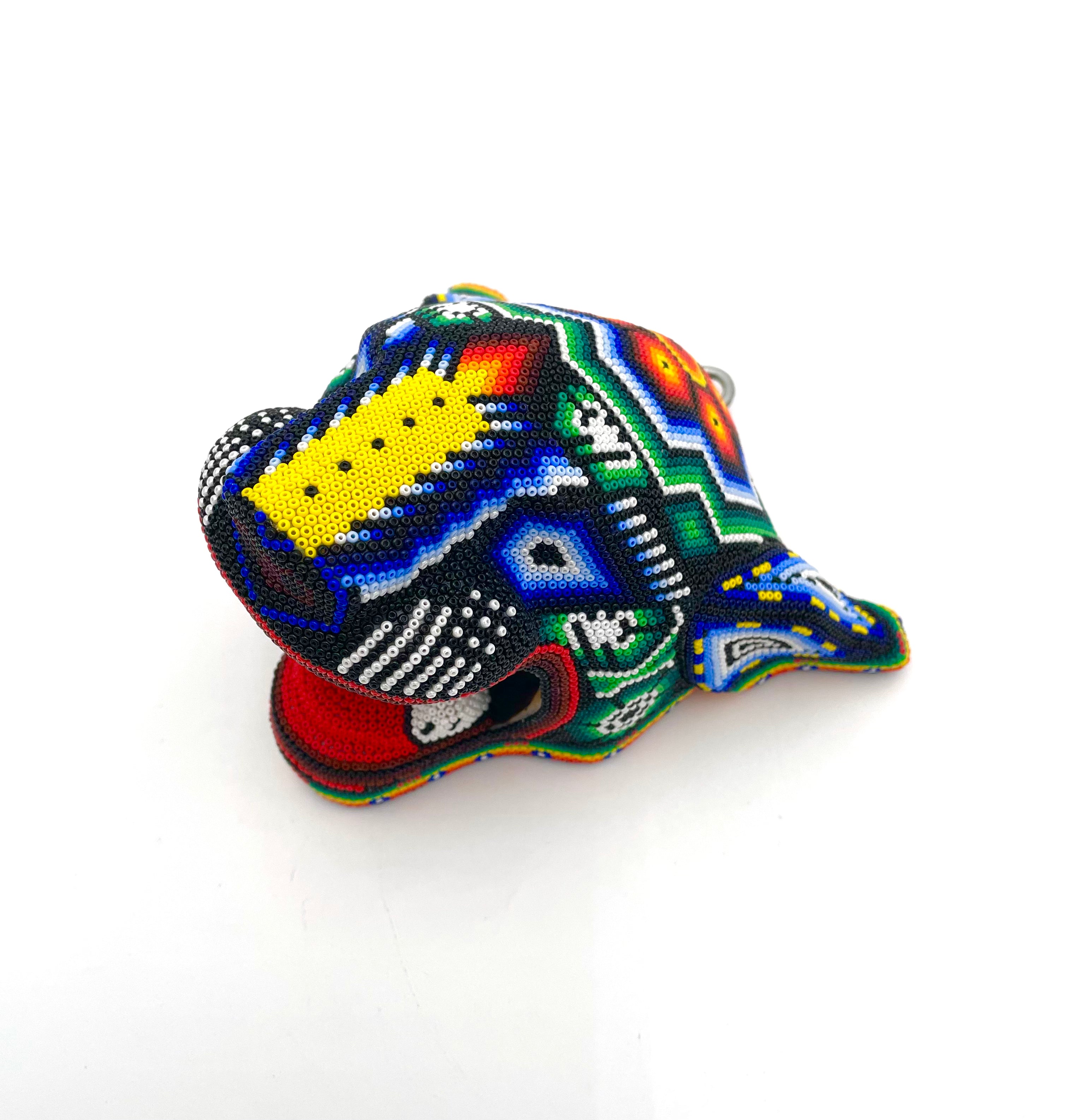 Huichol art jaguar head