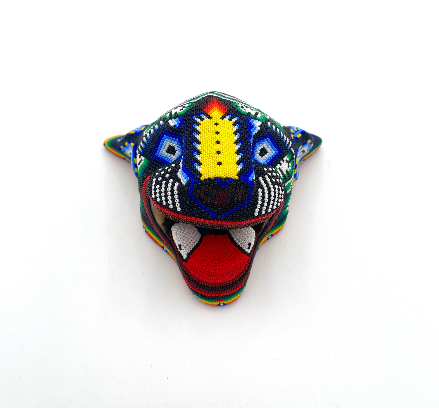 Huichol art jaguar head