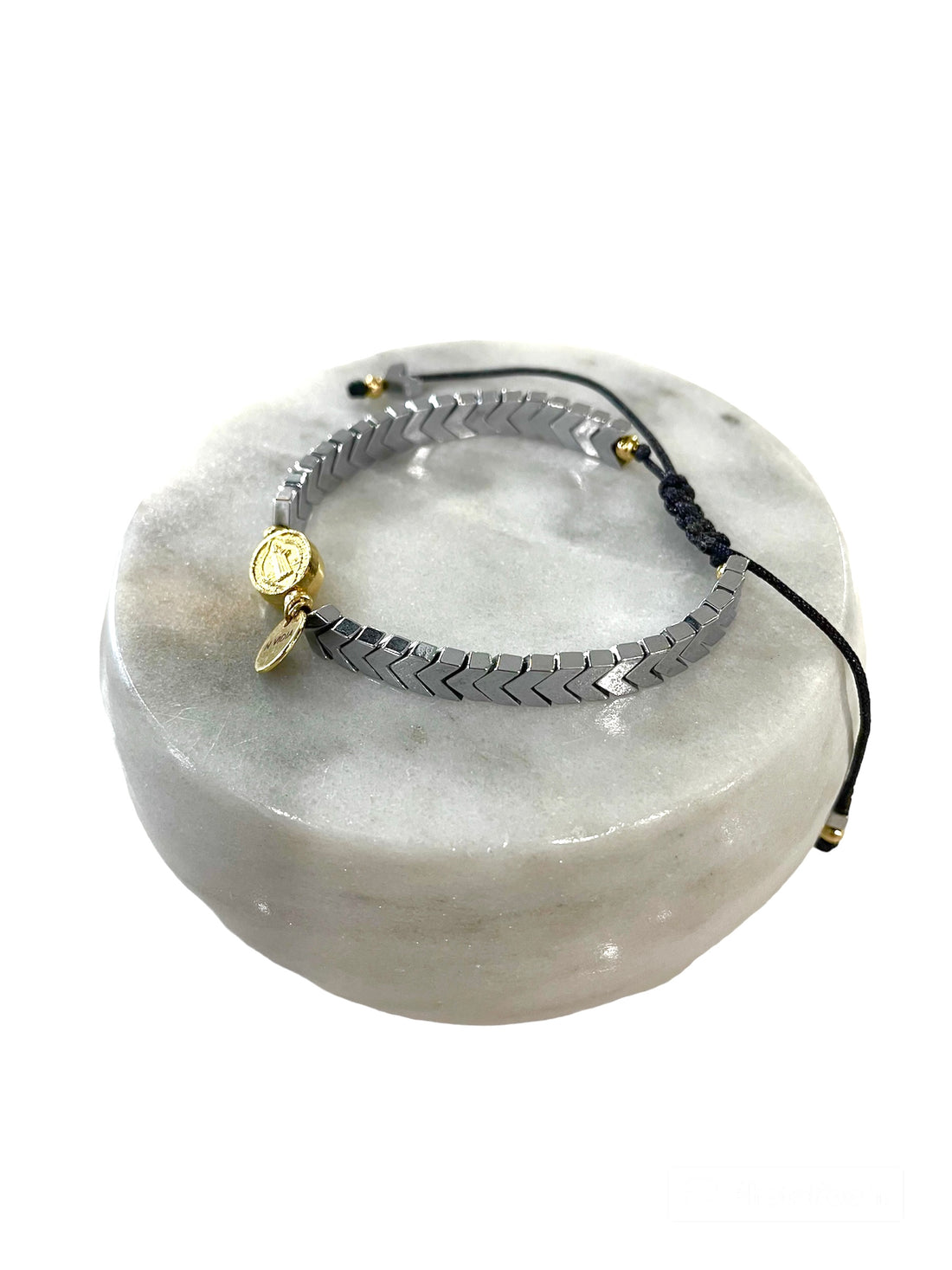 Handmade bracelet with gray hematite stone with gold